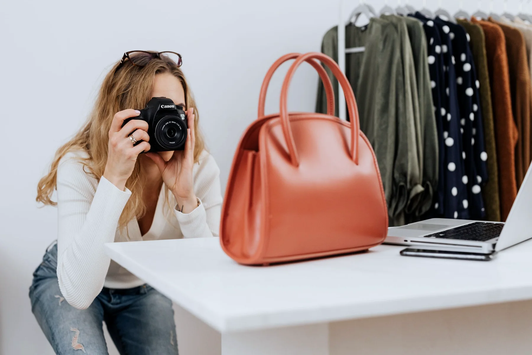 A photographer shooting product images for a campaign.